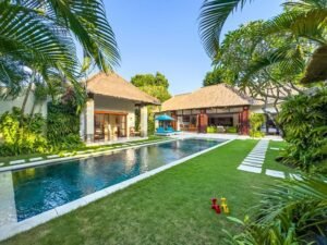 Tropical garden and swimming pool area at Villa Alore, a 6 bedroom Seminyak villa ideal for group stays
