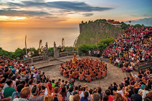 Kecak dance performance at Uluwatu Temple at sunset, a cultural family attraction in Bali