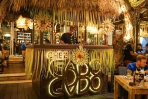 Stylish illuminated bar at Chez Gado Gado Seminyak, a top dining spot close to Villa Seminyak and 3 Bedroom Villa Seminyak.