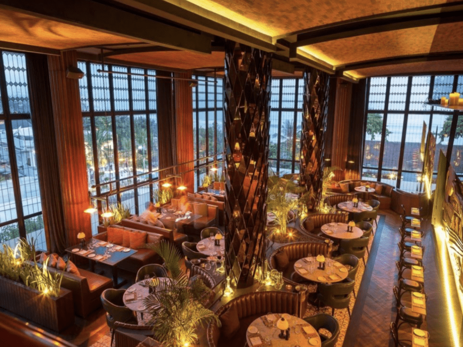 Group dining and evening entertainment at a Seminyak restaurant