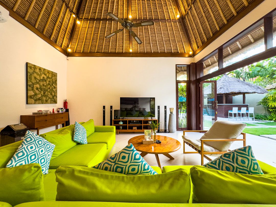 Elegant wooden decor and cozy seating arrangement in the living pavilion at Villa Alore Seminyak by Villa Bugis villa Seminyak.