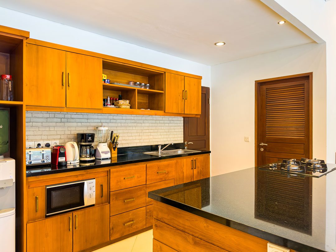 Fully equipped modern kitchen with high-quality appliances at Villa Alore Seminyak by Villa Bugis villa Seminyak.
