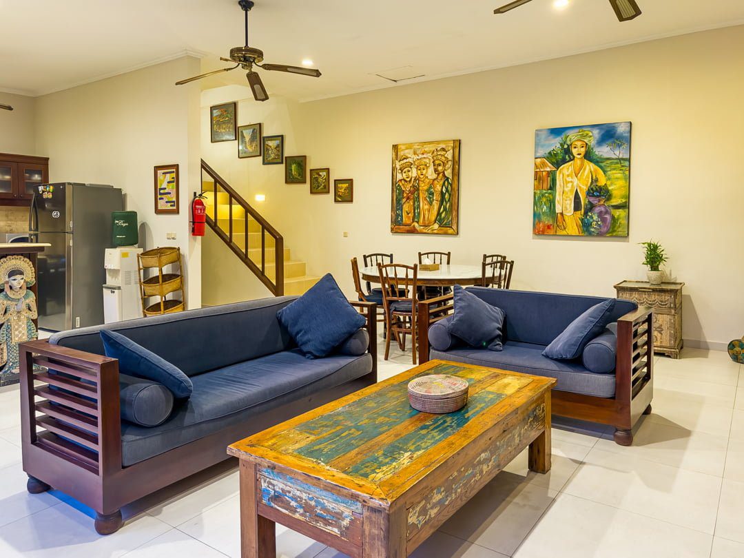 High-ceiling Balinese style open living pavilion at Villa Arjuna Seminyak by Villa Bugis, a signature feature of this luxury Seminyak villas property.