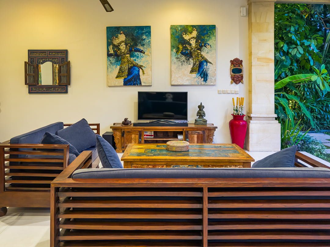 Cozy entertainment setup and lounge zone in the main living area at Villa Arjuna Seminyak by Villa Bugis villa Seminyak.