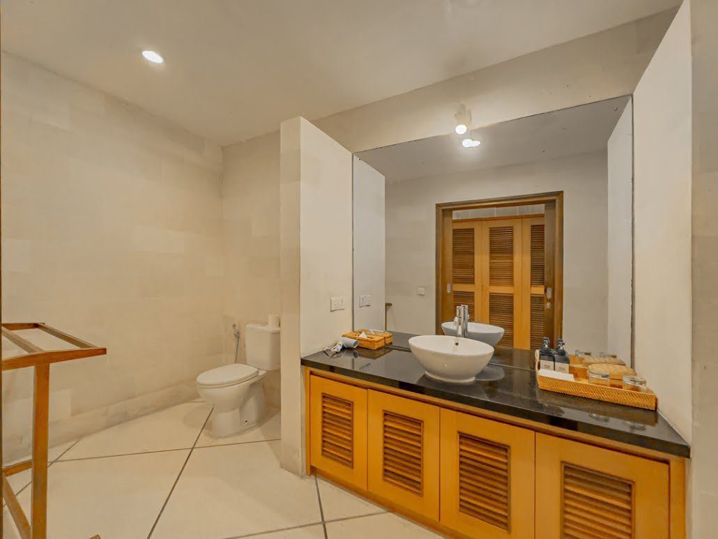 Stylish and pristine bathroom amenities attached to bedroom 5 at Villa Darma Seminyak by Villa Bugis Seminyak villas.