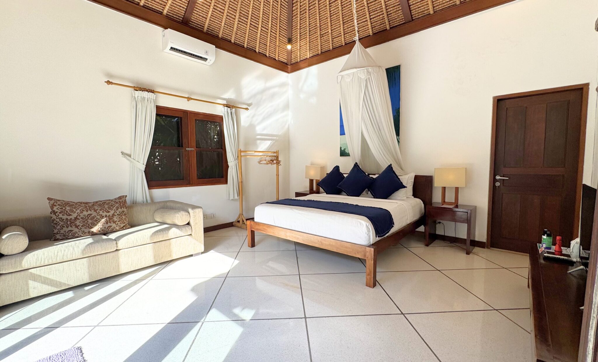 Modern colonial-style fourth bedroom at Villa Darma Seminyak by Villa Bugis, a spacious and clean 5-bedroom villa Seminyak option.