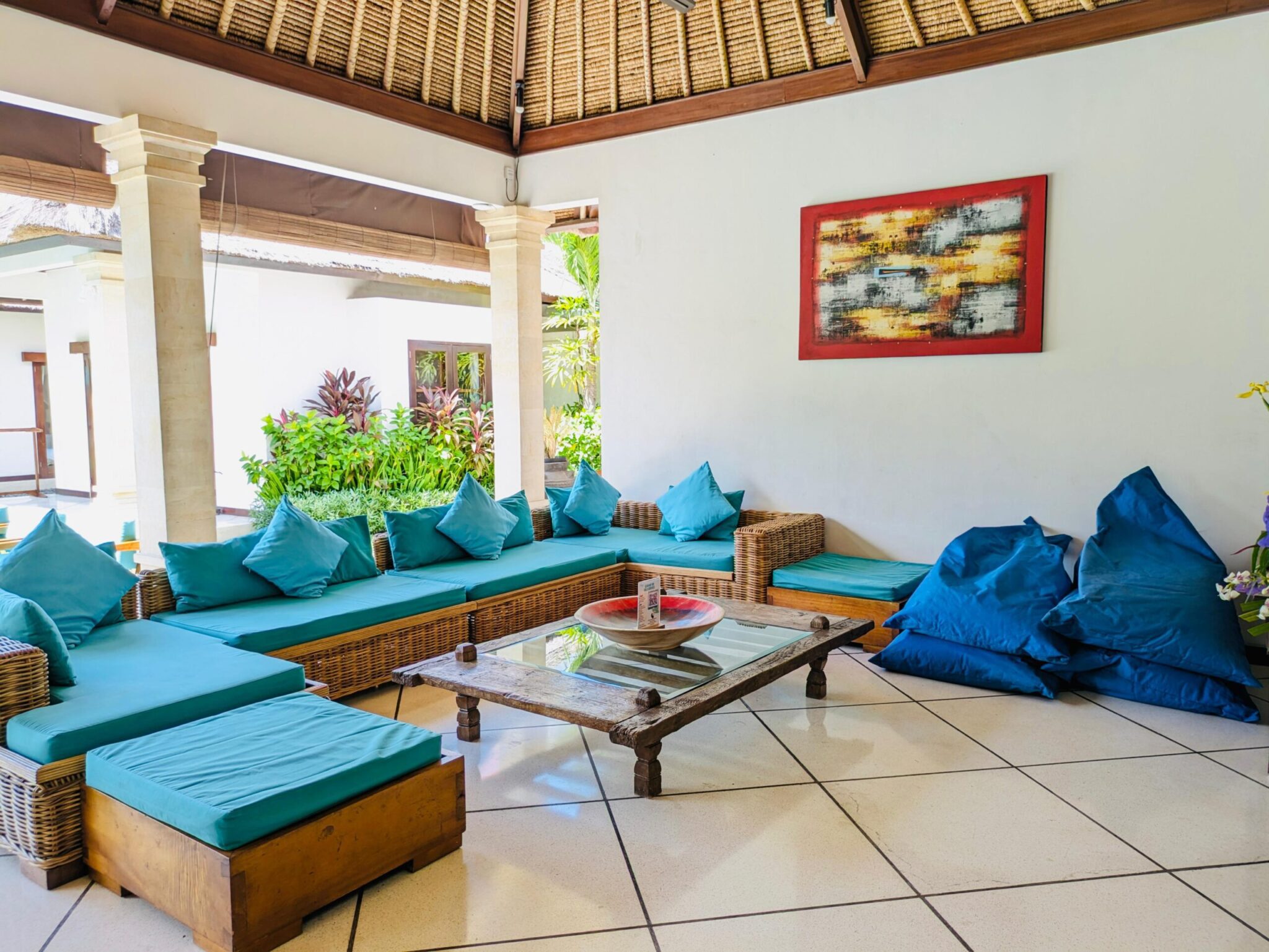 Tropical indoor-outdoor living concept showing the lounge space at Villa Darma Seminyak by Villa Bugis Seminyak villas.