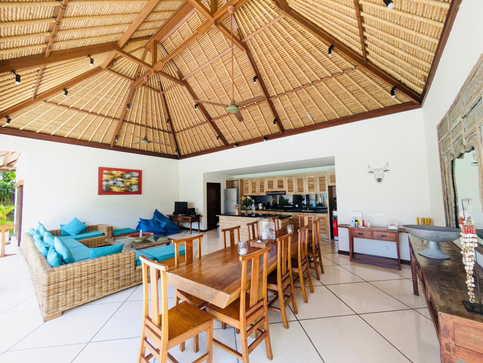 High-ceiling Balinese style open living area at Villa Darma Seminyak by Villa Bugis, a signature feature of this luxury Seminyak villas property.
