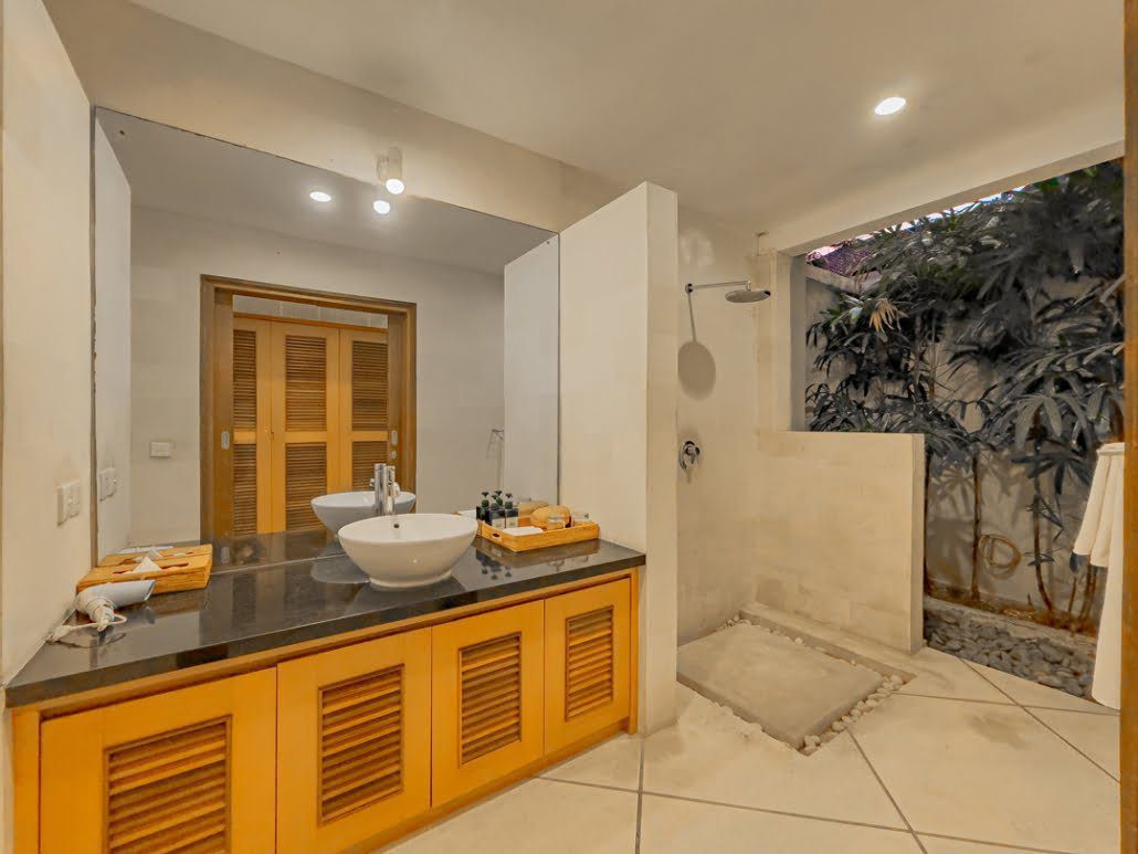 The fifth ensuite bathroom at Villa Darma Seminyak by Villa Bugis villa Seminyak, featuring an open-air shower concept.