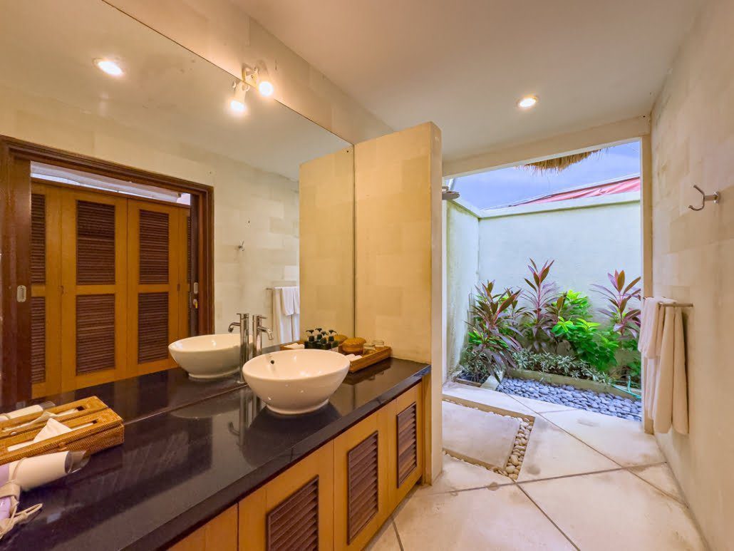 Semi-outdoor private bathroom attached to bedroom 2 at Villa Darma Seminyak by Villa Bugis, presenting a unique villa Seminyak experience.