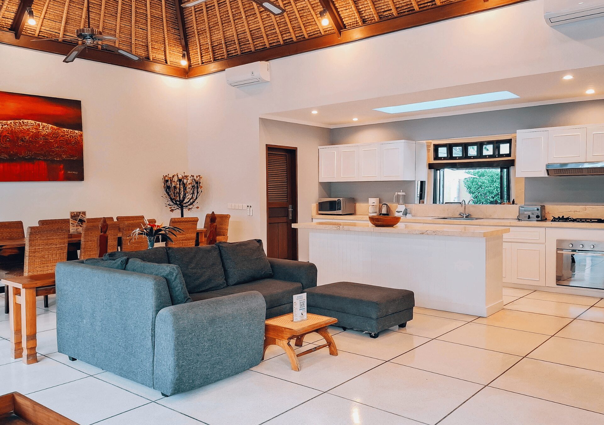 Cozy lounge and dining zone for family gatherings at Villa Gembira Seminyak by Villa Bugis villa Seminyak.