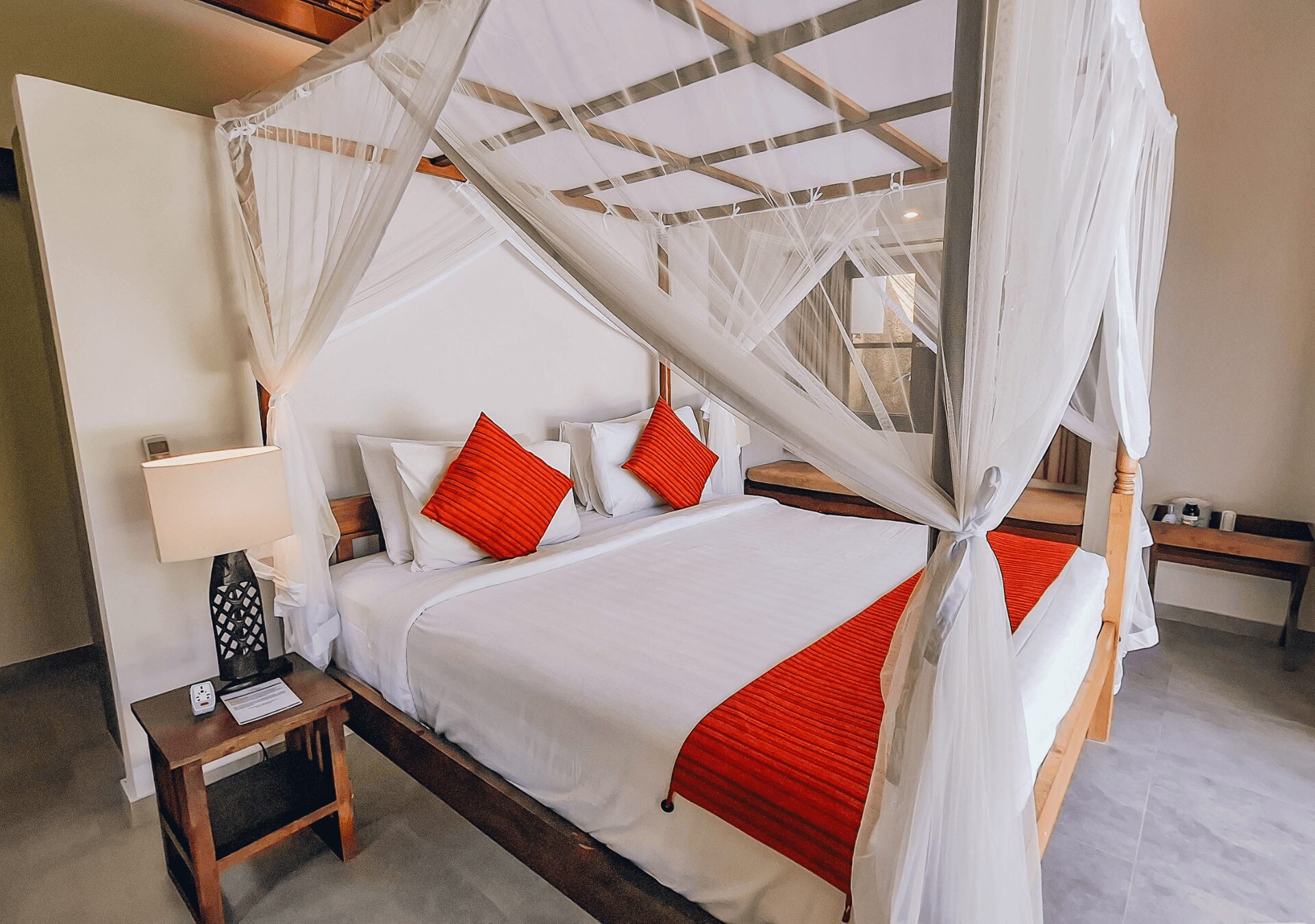 Tastefully decorated interior layout of bedroom 2 at Villa Gembira Seminyak by Villa Bugis villa Seminyak, featuring soft natural daylighting.