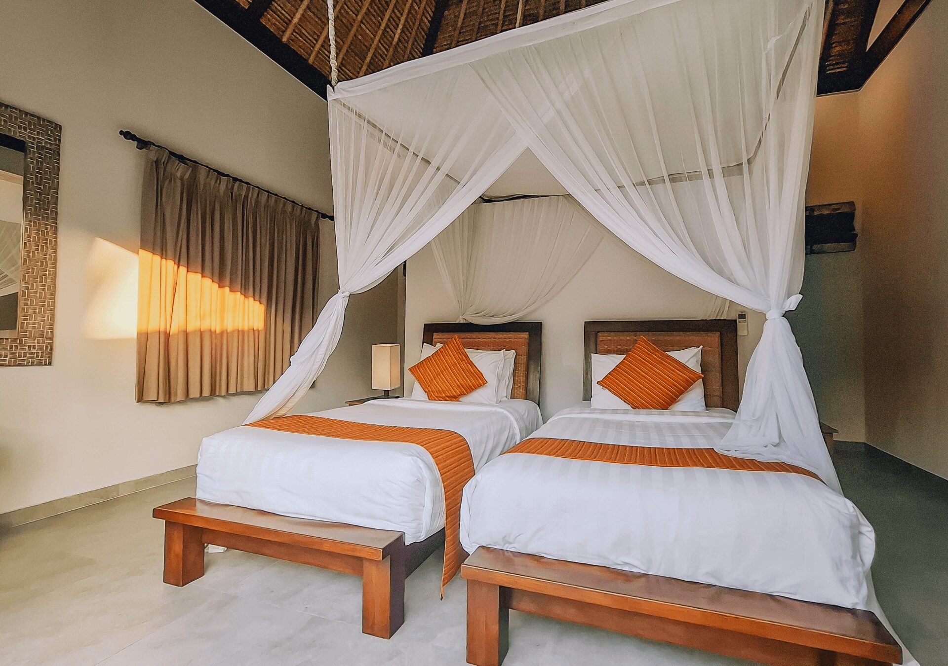 Contemporary Balinese styling and twin bed layout of bedroom 3 at Villa Gembira Seminyak by Villa Bugis, a standout choice among Seminyak villas.