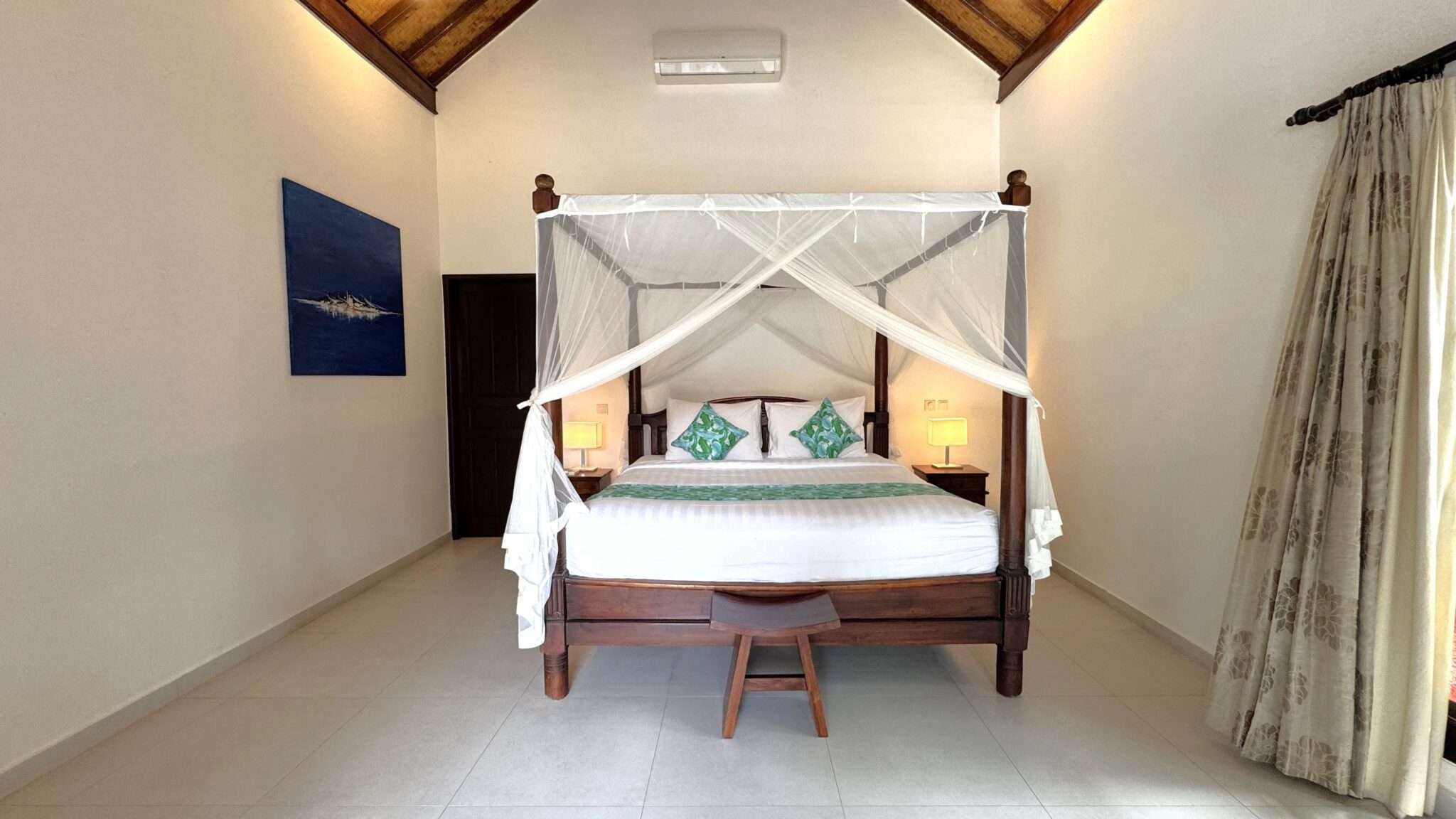 Elegant master bedroom with a premium king-size bed setup at Villa Ginger Seminyak by Villa Bugis, a top-rated villa Seminyak for a relaxing stay.