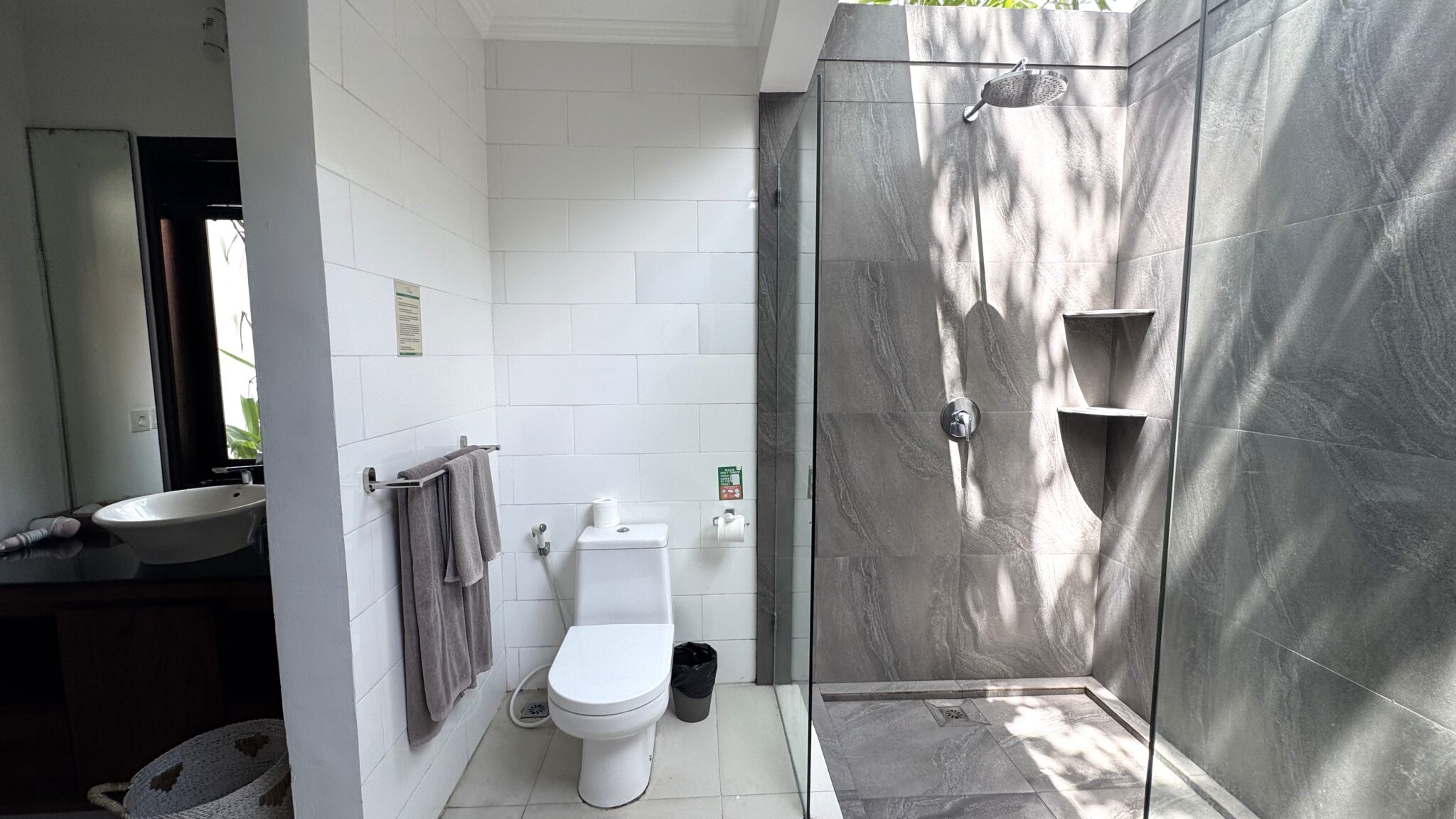 Bright and airy open-air bathroom space with natural light accents in bedroom 3 at Villa Ginger Seminyak by Villa Bugis villa Seminyak.