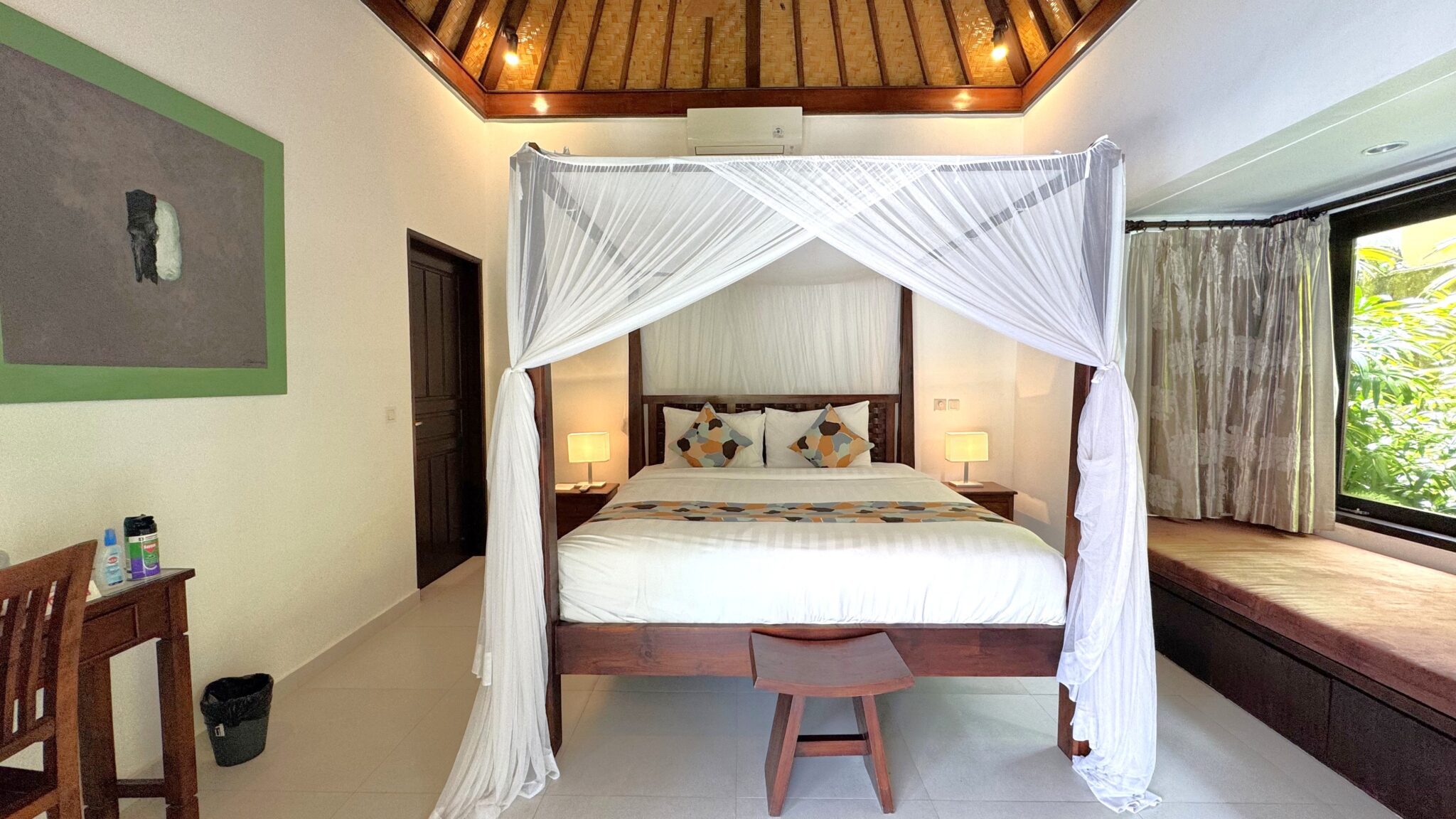 Serene third bedroom at Villa Ginger Seminyak by Villa Bugis villa Seminyak with premium bedding and a direct view overlooking the pool area.