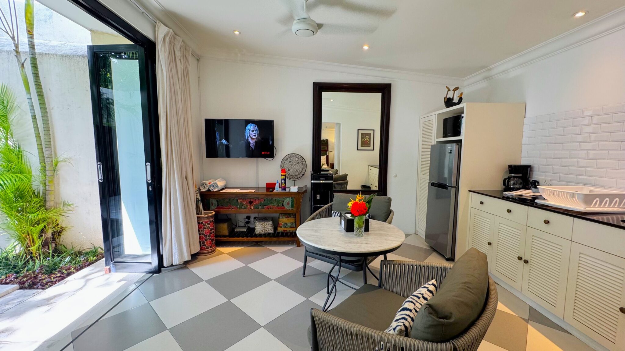 Cozy indoor relaxation space featuring modern architectural details at Villa Ibu Dua Seminyak by Villa Bugis Seminyak villas.