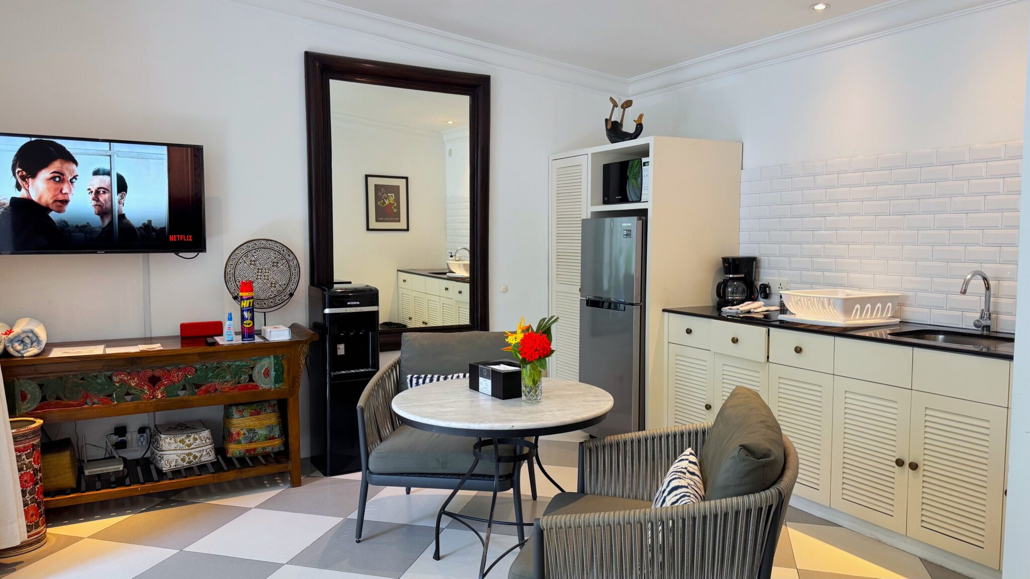 Fully equipped open-concept kitchen with modern cooking appliances at Villa Ibu Dua Seminyak by Villa Bugis villa Seminyak.
