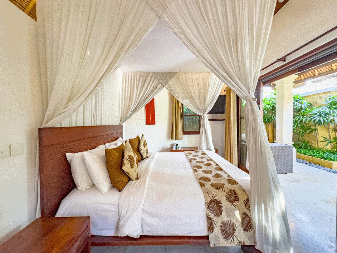 Contemporary tropical interior styling of bedroom 2 at Villa Jaclan Seminyak by Villa Bugis, a standout among boutique Seminyak villas.