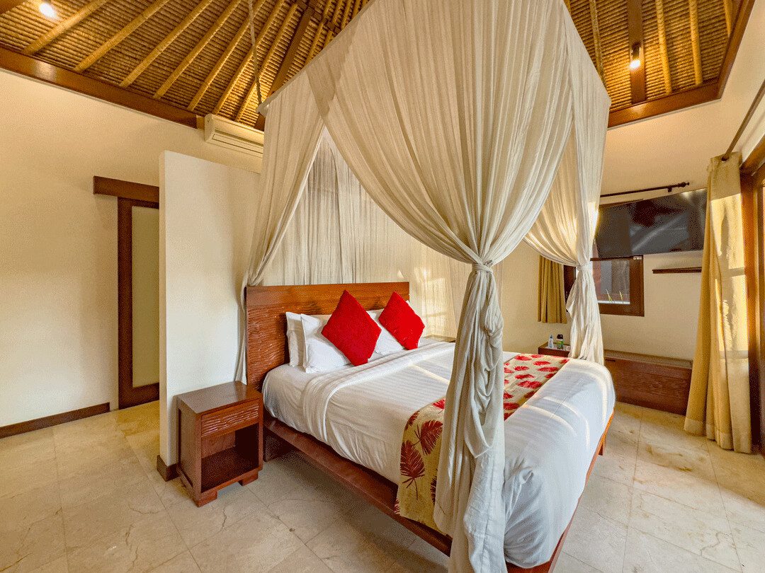 Neatly arranged bed setup and interior layout of bedroom 3 at Villa Jaclan Seminyak by Villa Bugis, ideal for groups looking for strategic Seminyak villas.