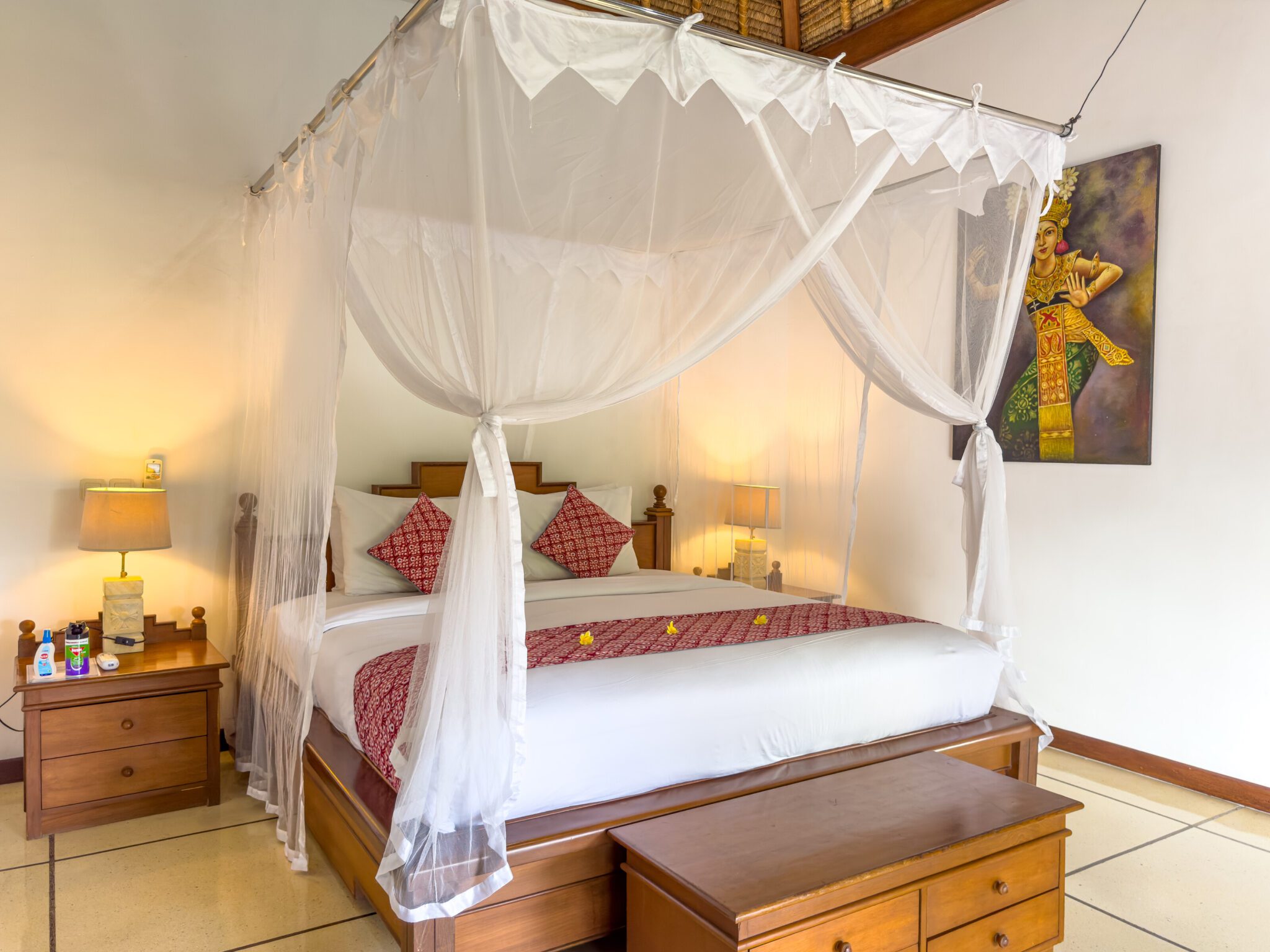 Elegant master bedroom featuring a comfortable king-size bed with tropical decor at Villa Krisna Seminyak by Villa Bugis, a top-rated villa Seminyak.