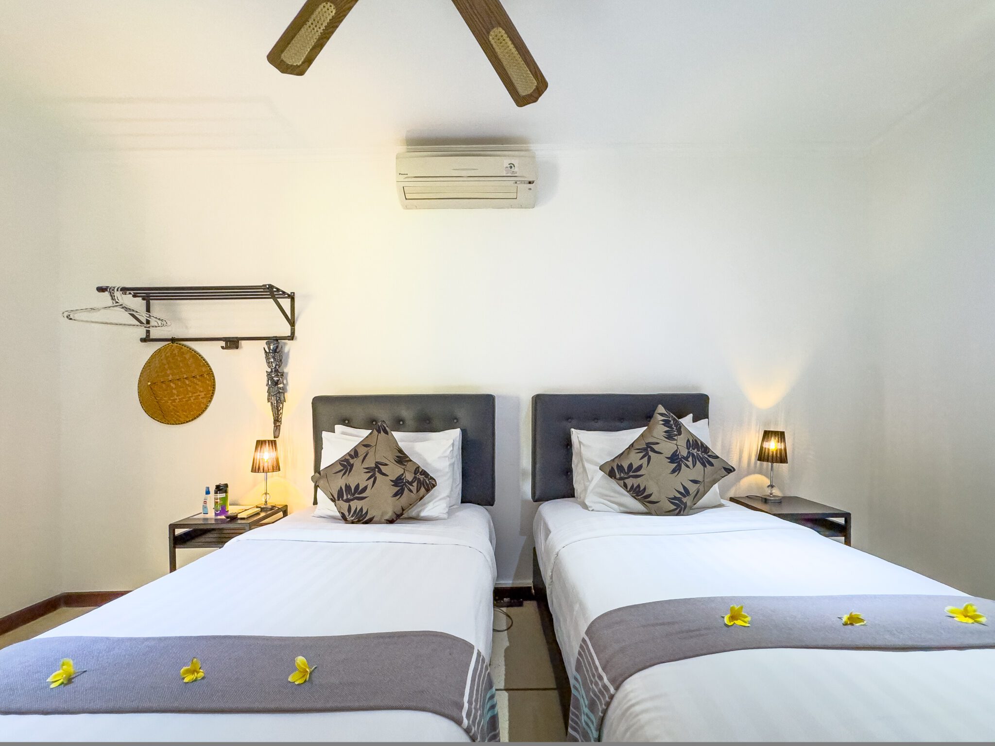 Guest bedroom 3 featuring neatly arranged twin beds at Villa Krisna Seminyak by Villa Bugis, offering flexible arrangements in a 3-bedroom villa Seminyak.