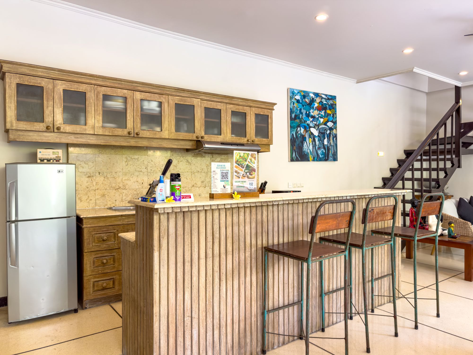 Spacious kitchen counter and dining preparation area at Villa Nakula Seminyak by Villa Bugis, offering self-catering convenience in Seminyak villas.