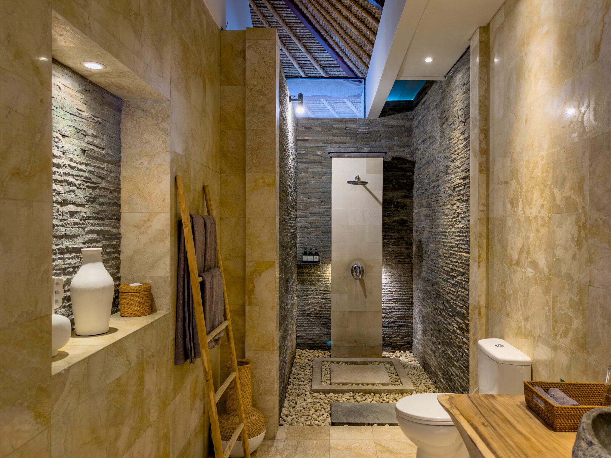 Clean modern vanity and refreshing shower space in the bathroom of bedroom 3 at Villa Olive Seminyak by Villa Bugis Seminyak villas.