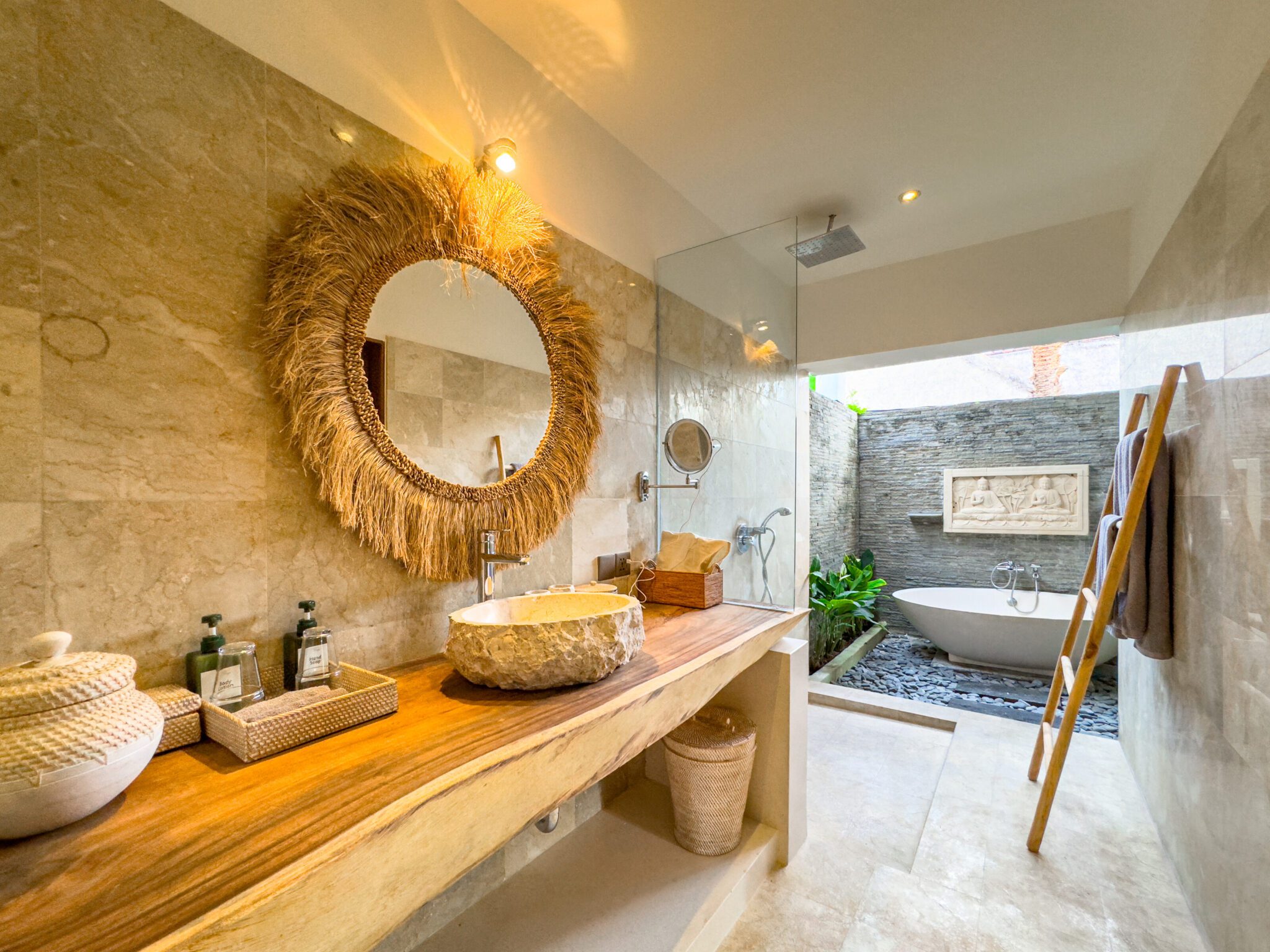 Pristine vanity setup and a soaking bathtub inside the private bathroom of bedroom 2 at Villa Olive Seminyak by Villa Bugis villa Seminyak.