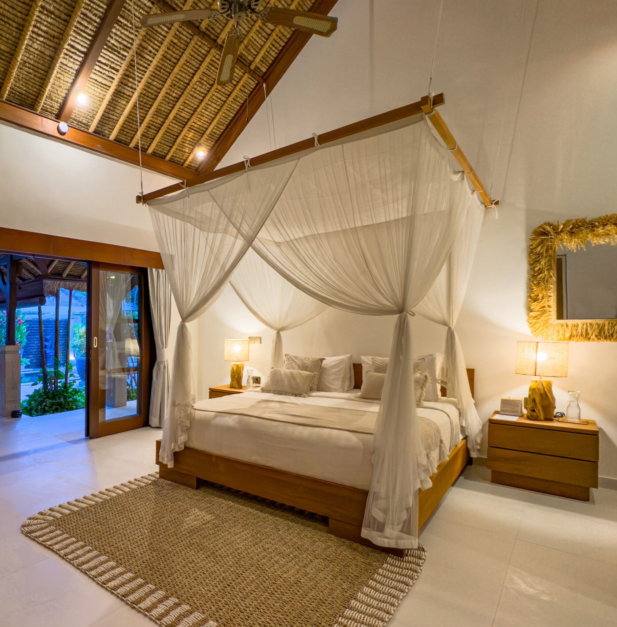Tastefully decorated interior of bedroom 2 at Villa Olive Seminyak by Villa Bugis villa Seminyak, featuring soft natural daylighting.