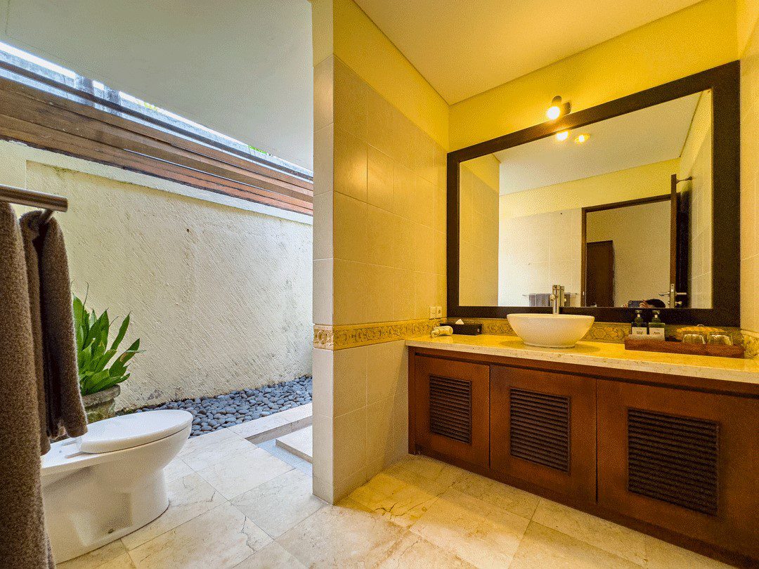 Private open-air guest bathroom attached to bedroom 4 at Villa Santi Seminyak by Villa Bugis villa Seminyak.