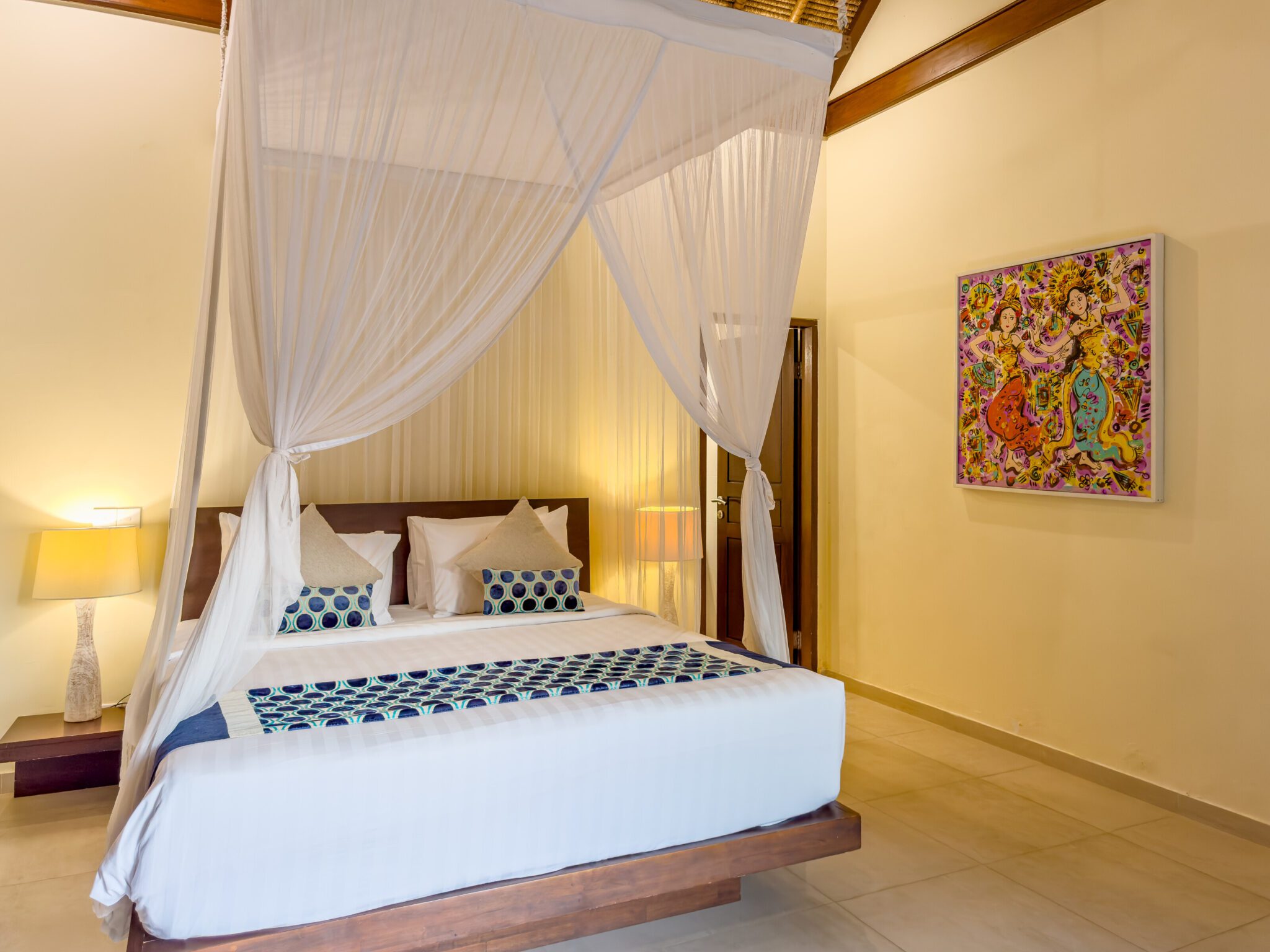 Comfortable fourth bedroom with a king-size bed at Villa Saphir Seminyak by Villa Bugis, offering quiet privacy in a spacious 4-bedroom villa Seminyak.