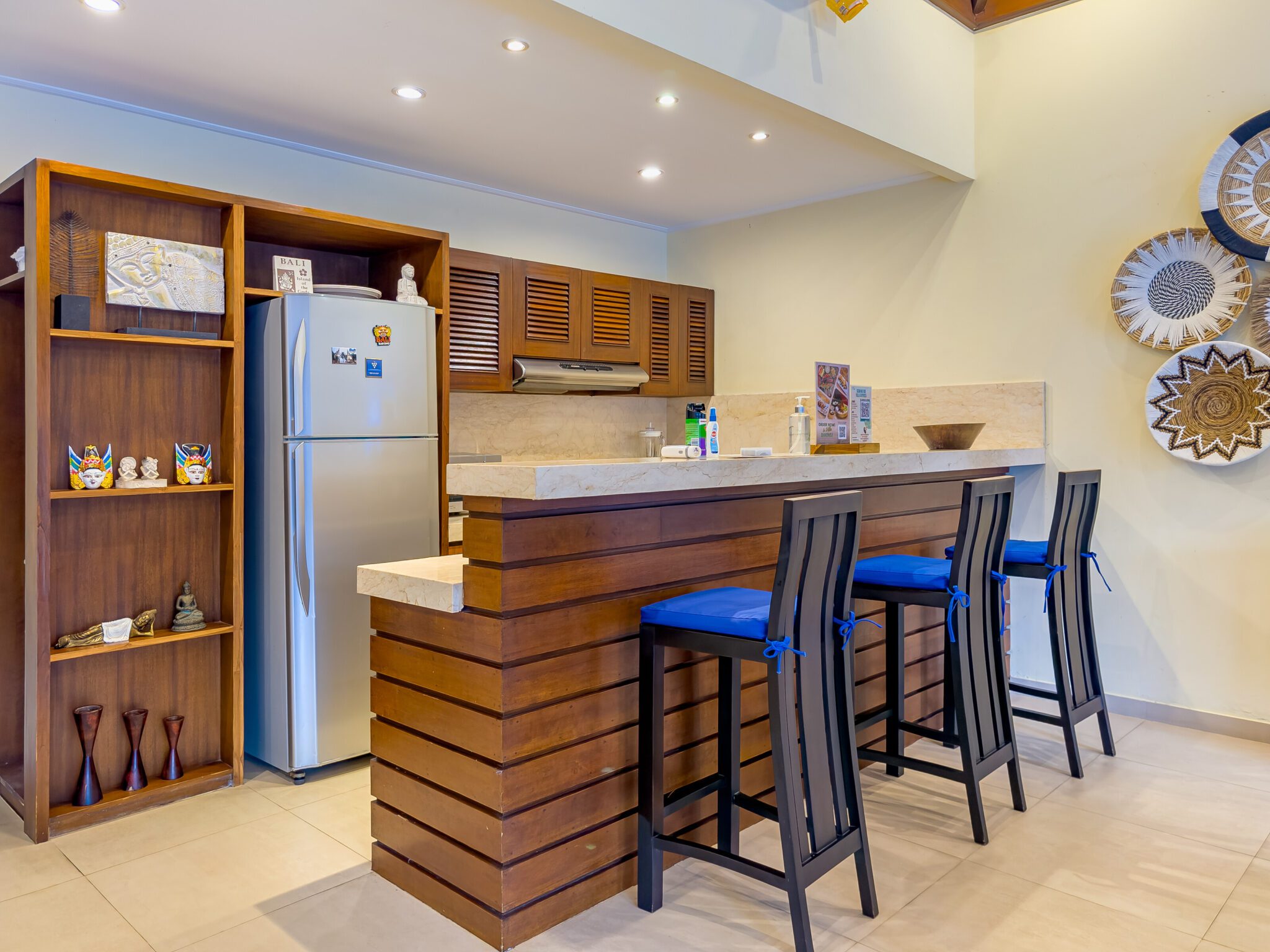 Spacious kitchen counter and dining preparation area at Villa Saphir Seminyak by Villa Bugis, offering self-catering convenience in Seminyak villas.