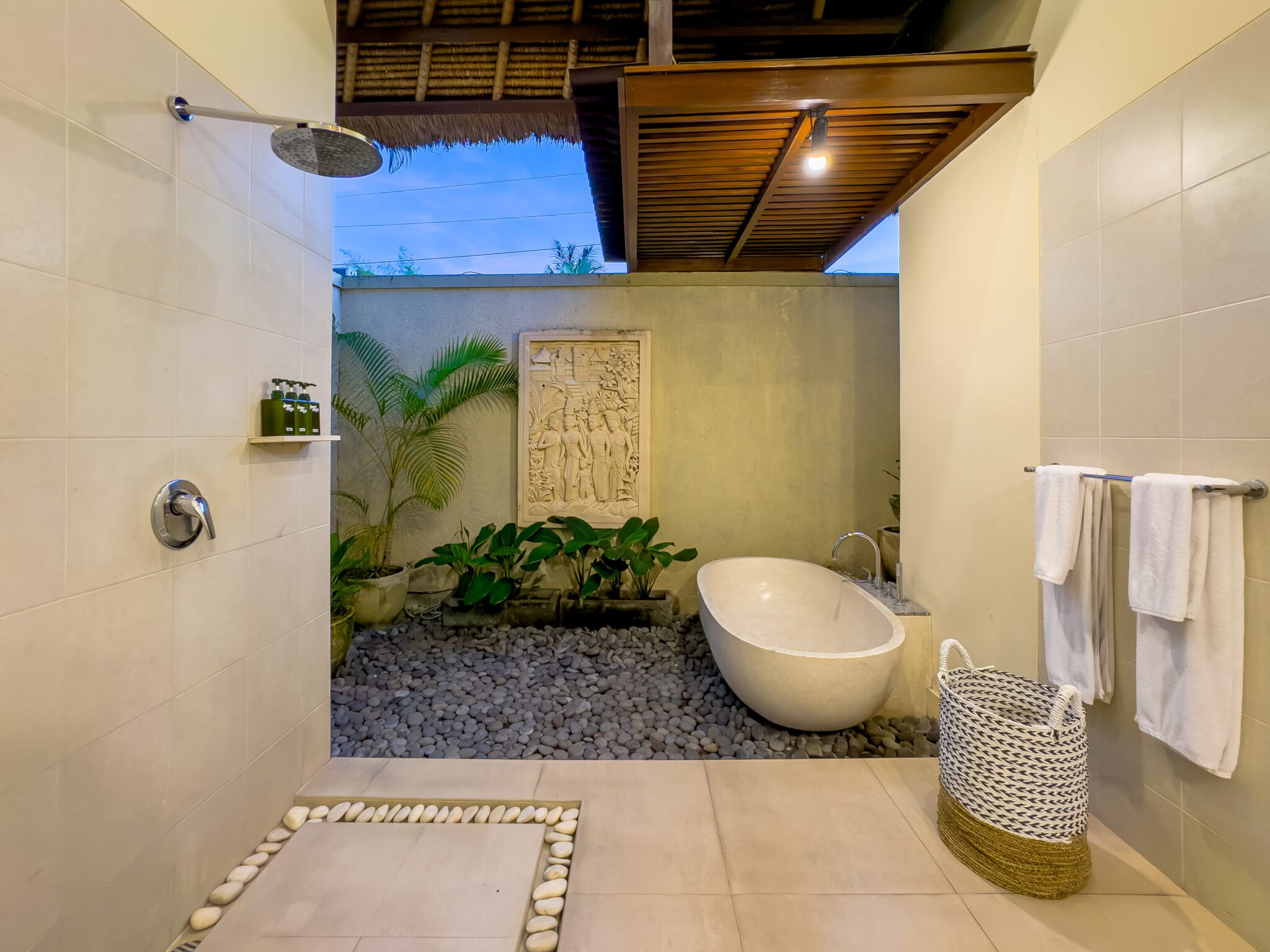 Pristine vanity setup and clean shower space inside the open-air bathroom of bedroom 2 at Villa Saphir Seminyak by Villa Bugis villa Seminyak.