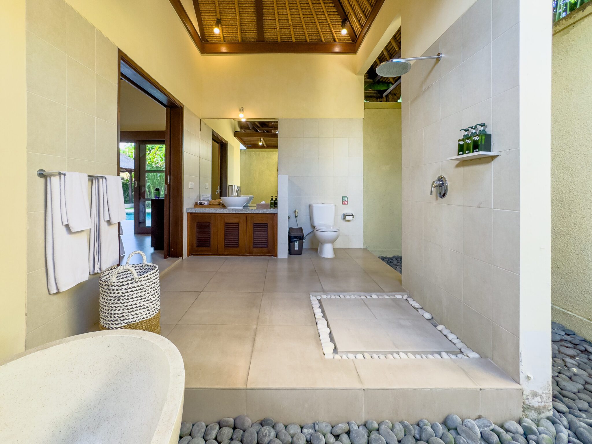 Private ensuite bathroom with modern fixtures attached to twin bedroom 2 at Villa Saphir Seminyak by Villa Bugis Seminyak villas.