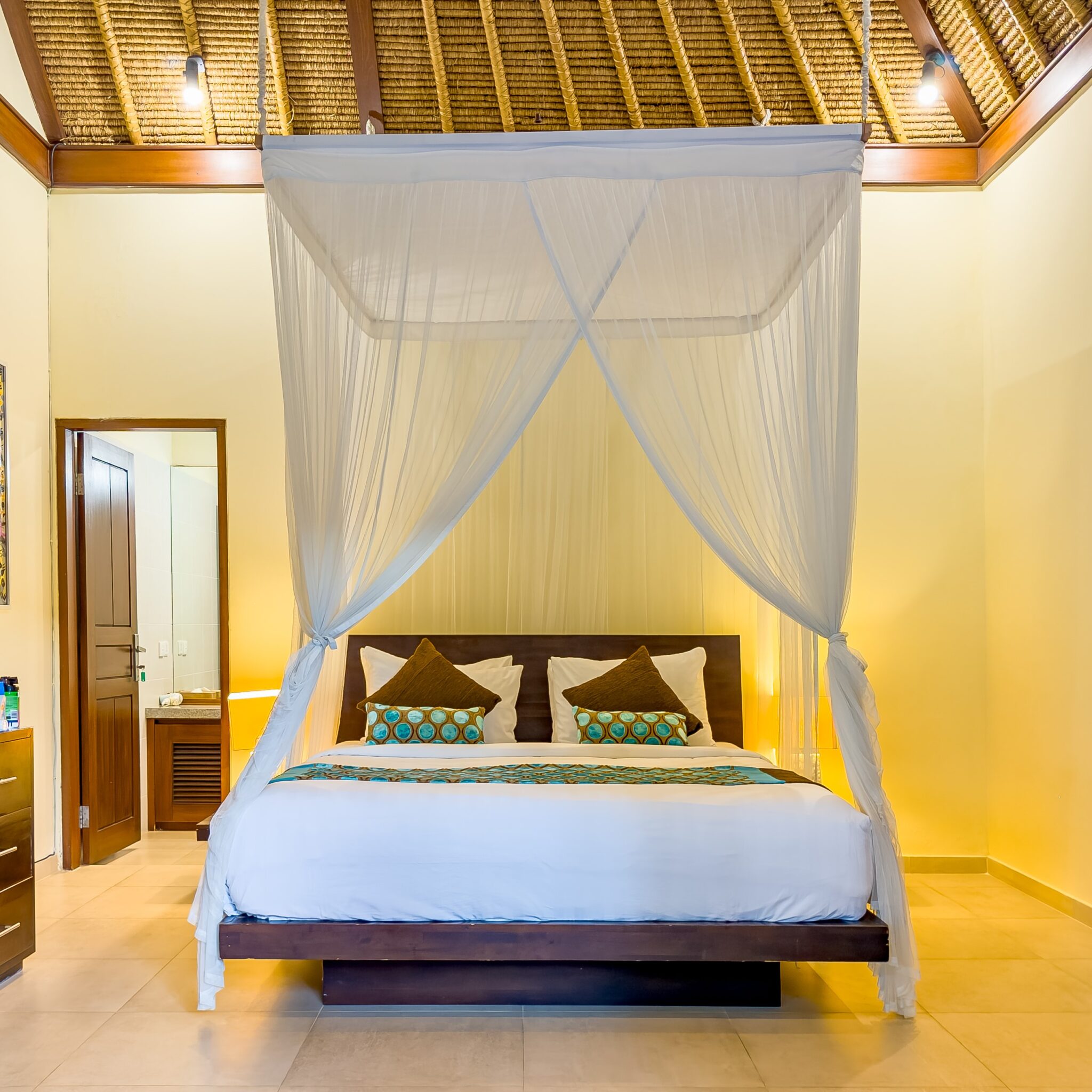 Tastefully decorated interior layout of bedroom 3 at Villa Saphir Seminyak by Villa Bugis Seminyak villas, featuring soft natural daylighting.