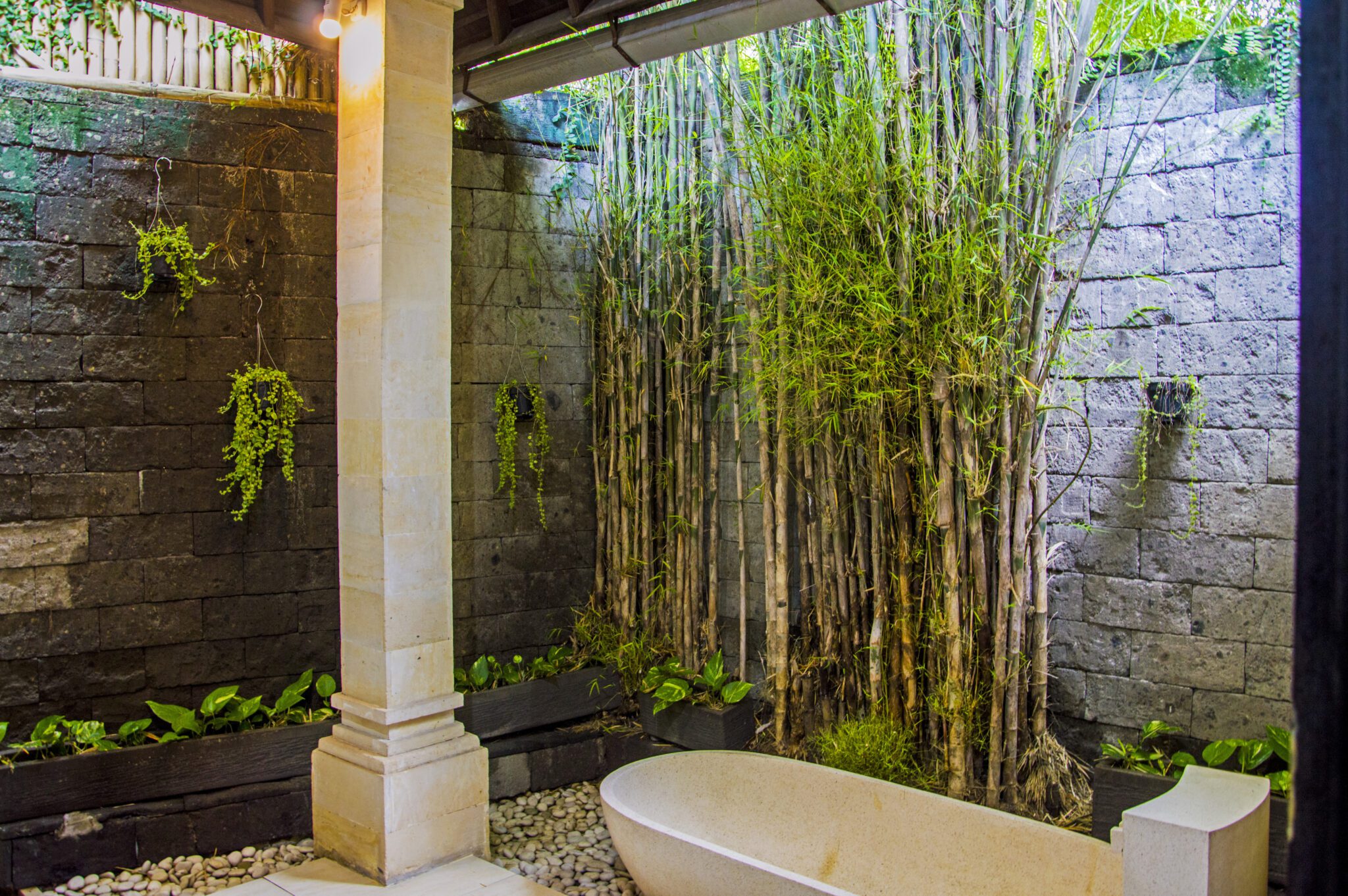 Private open-air guest bathroom attached to bedroom 4 at Villa Tresna Seminyak by Villa Bugis villa Seminyak.
