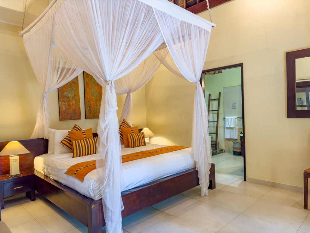 Serene third guest bedroom with premium king bedding at Villa Tresna Seminyak by Villa Bugis, a recommended choice among Seminyak villas.