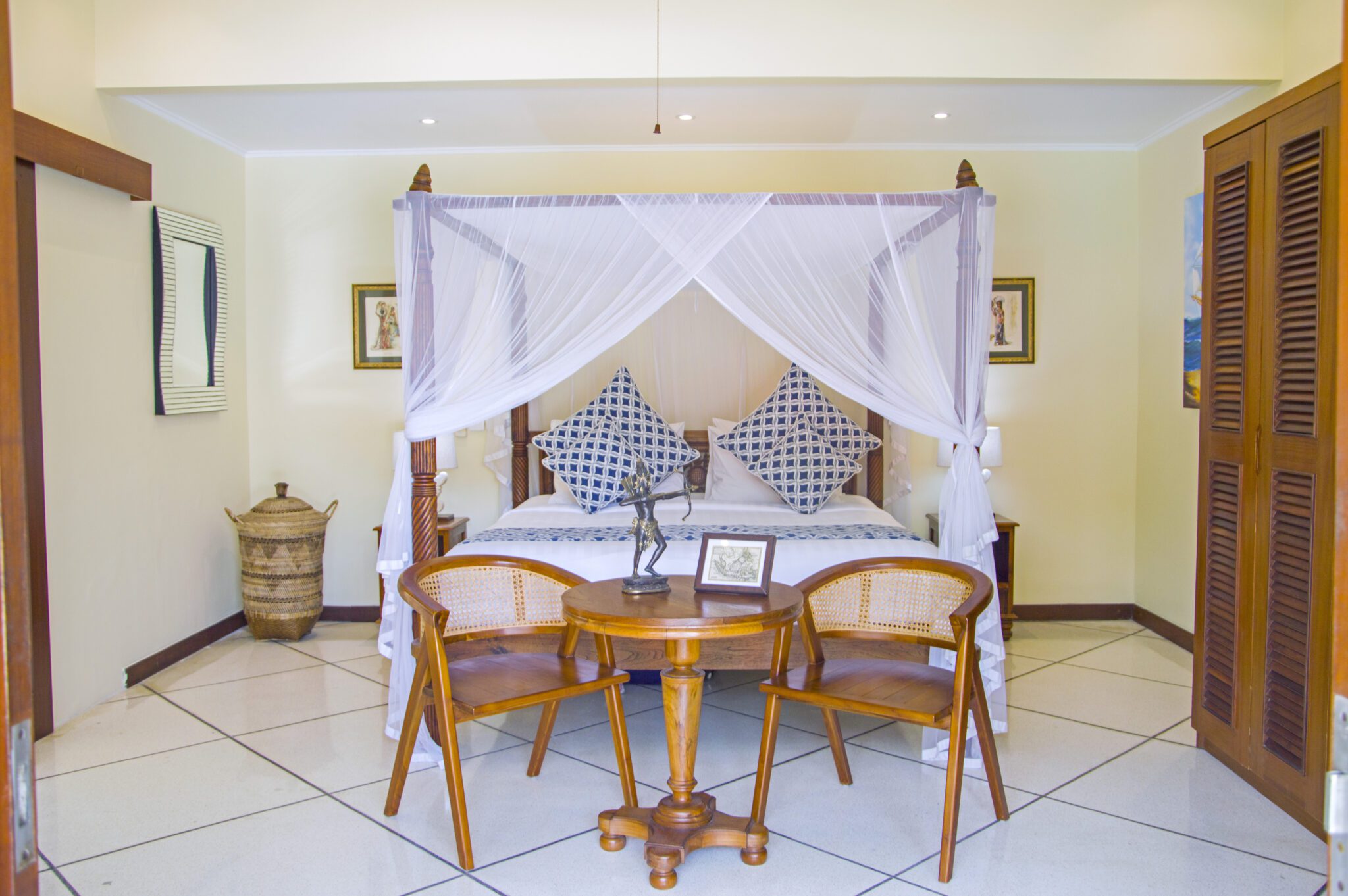 Master bedroom suite featuring a luxurious king-size bed with tropical decor at Villa Vara Seminyak by Villa Bugis, a top-rated villa Seminyak.