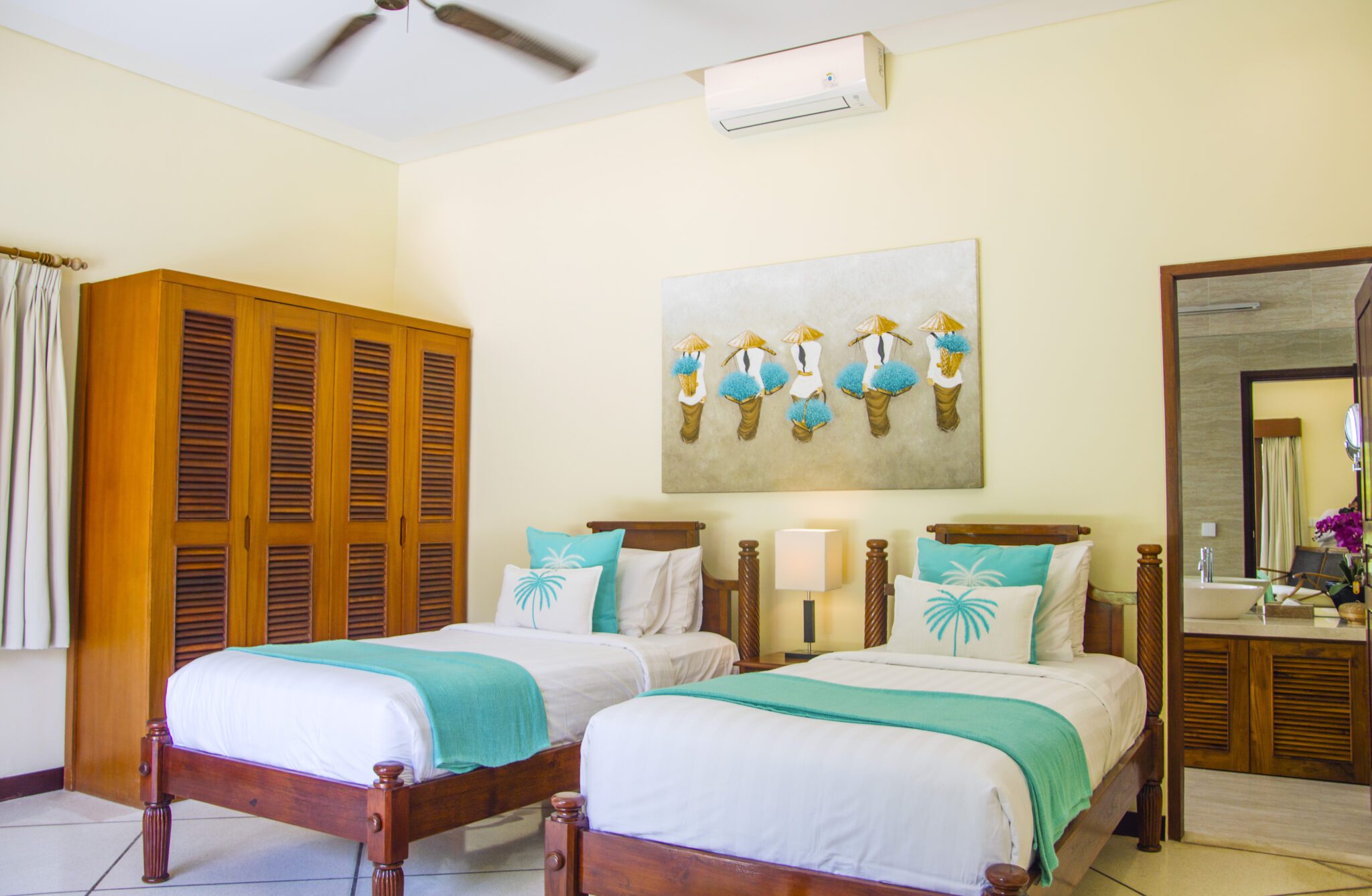 Guest bedroom 3 featuring neatly arranged twin beds at Villa Vara Seminyak by Villa Bugis, offering flexible arrangements in a 4-bedroom villa Seminyak.